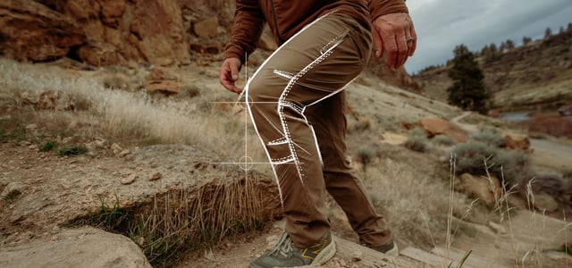 A man wearing a Kühl  Rydr lite pants.